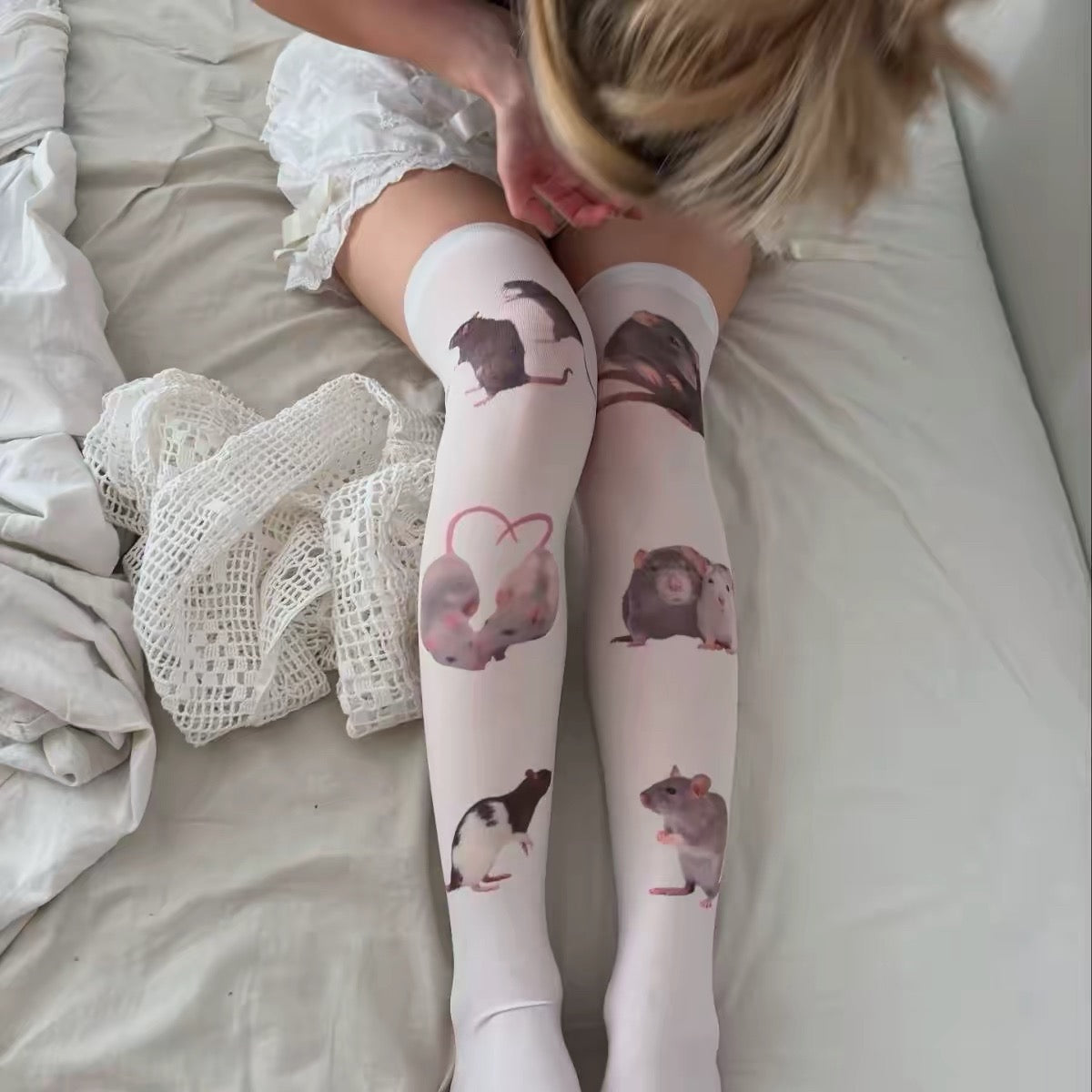 Rat print thigh-high stockings worn