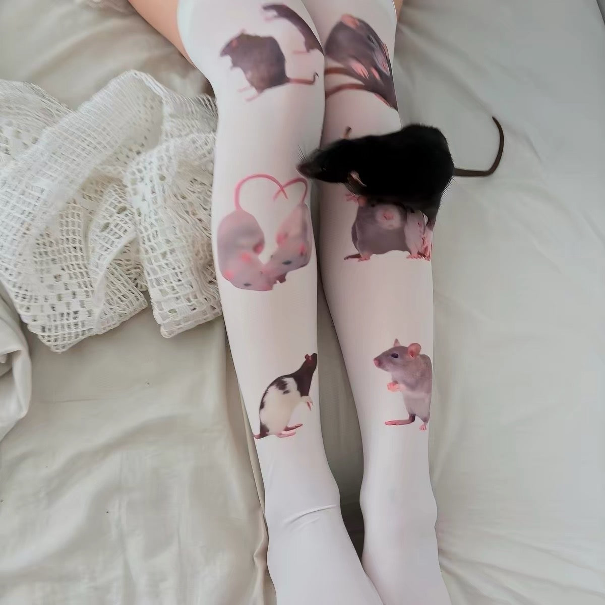 Rat print thigh-high stockings detail