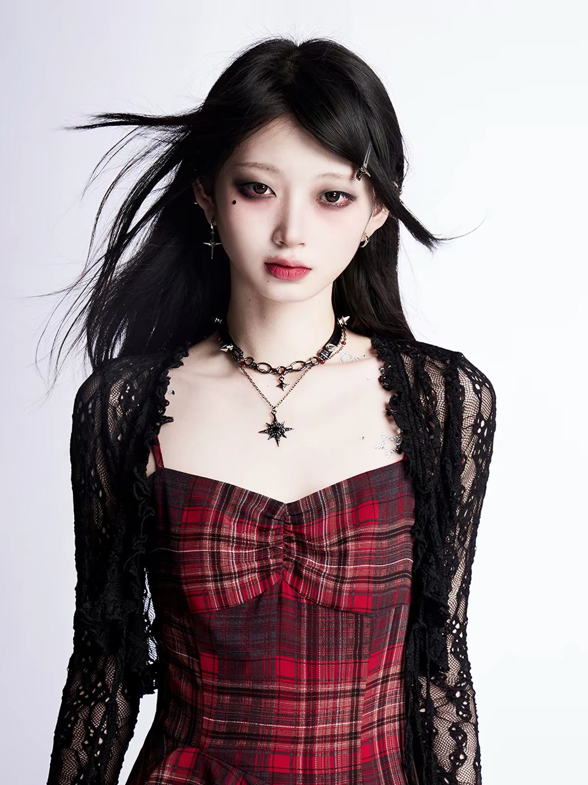 Close view of red plaid dress bodice and plaid pattern