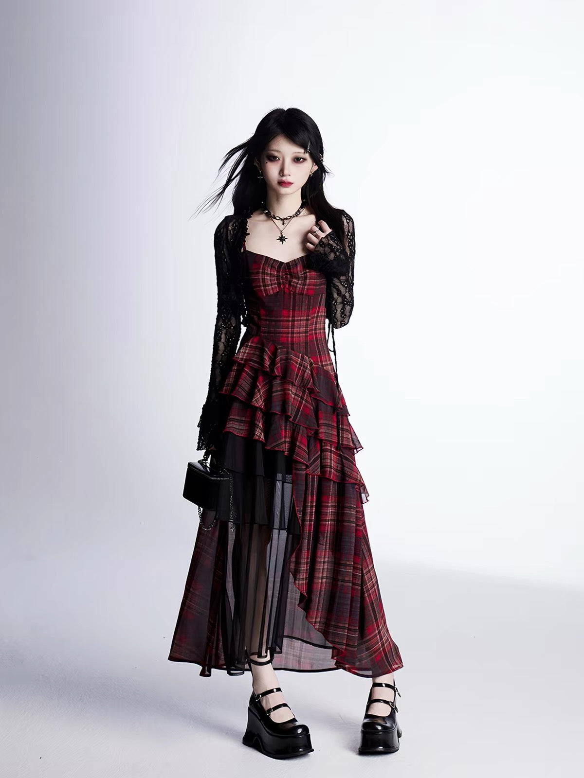 Full view of model wearing red plaid asymmetrical dress