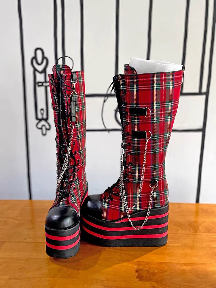 Red plaid knee-high platform boots pair