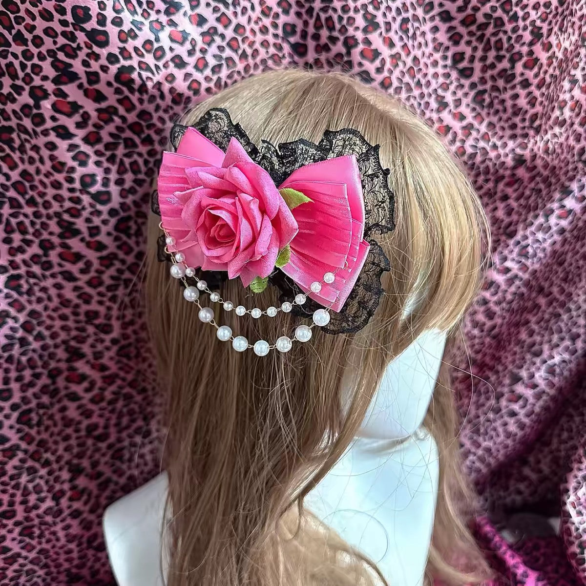 Rose Pink bow worn in hair