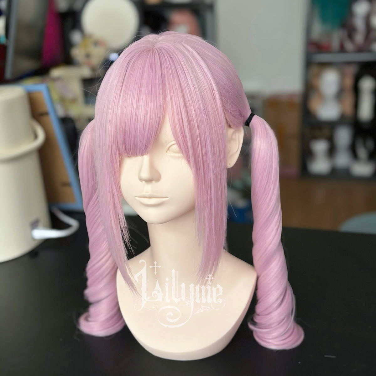 Soft pink Sakura Curl twin-tail spiral wig