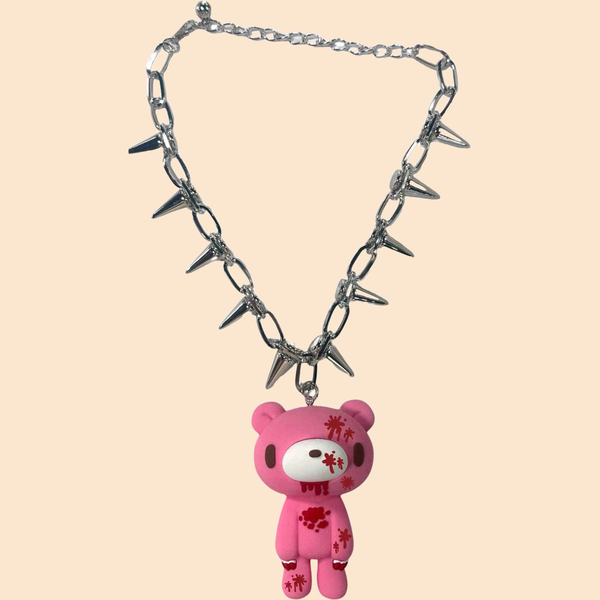Pink spiked chain necklace with bear charm