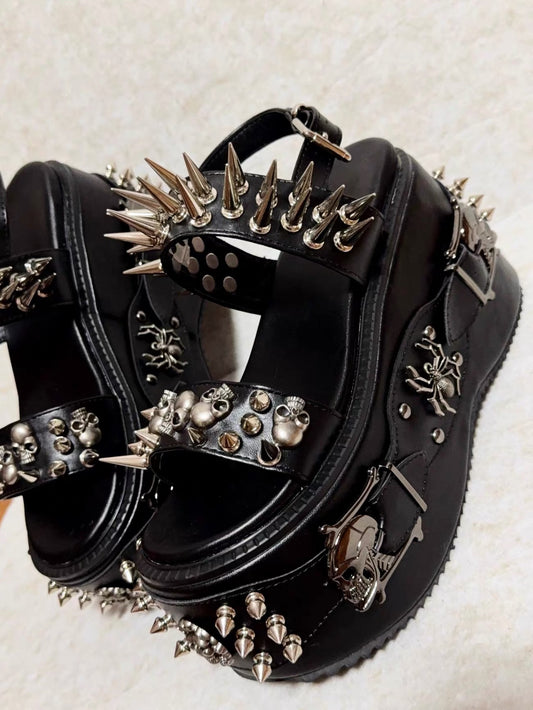 Black spiked skull platform sandals with silver hardware