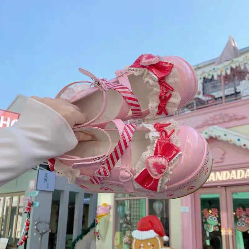 Pink lace platform Lolita shoes with bows and heart accents