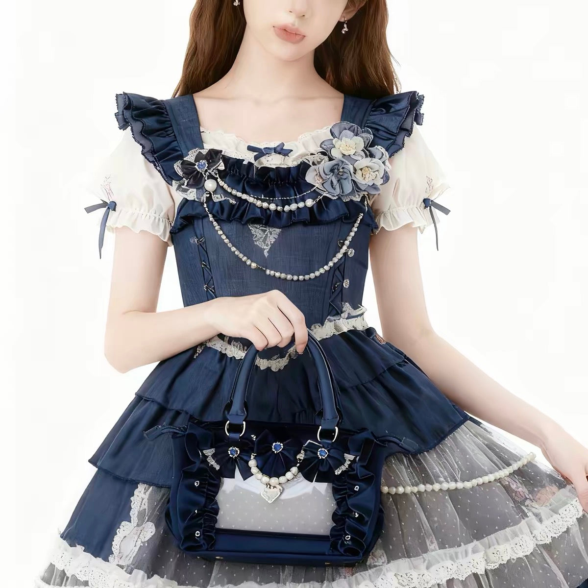 Navy velvet bow ita bag modeled with Lolita outfit