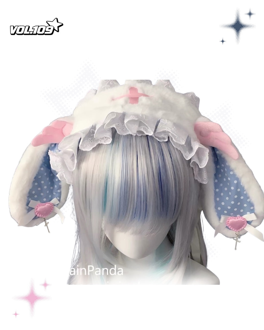 White plush bunny ear headdress with blue and pink details