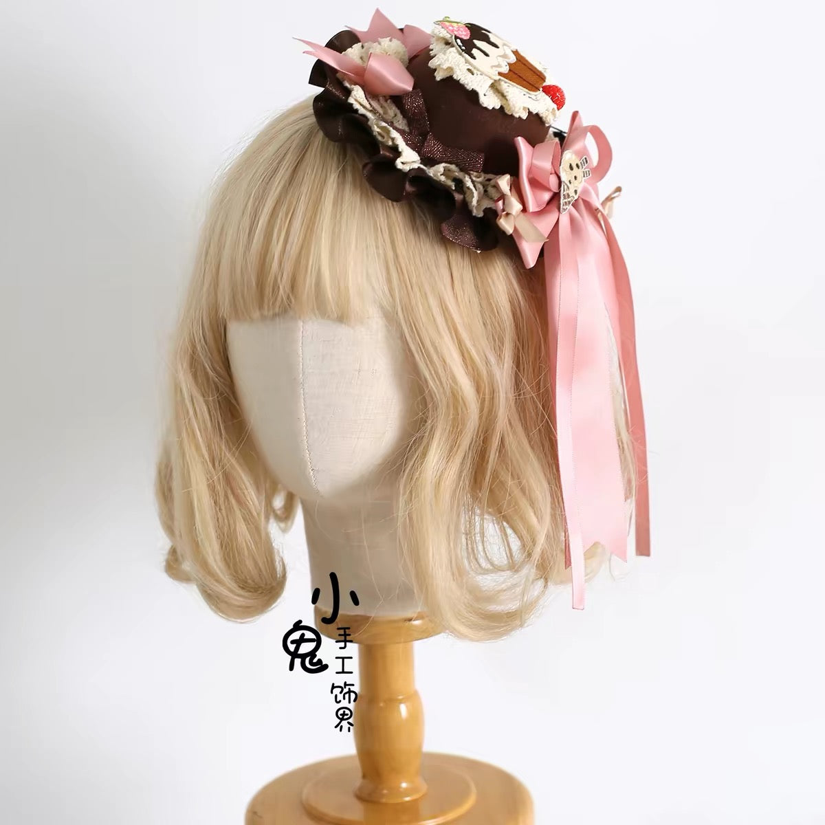 Chocolate and pink dessert headdress side view