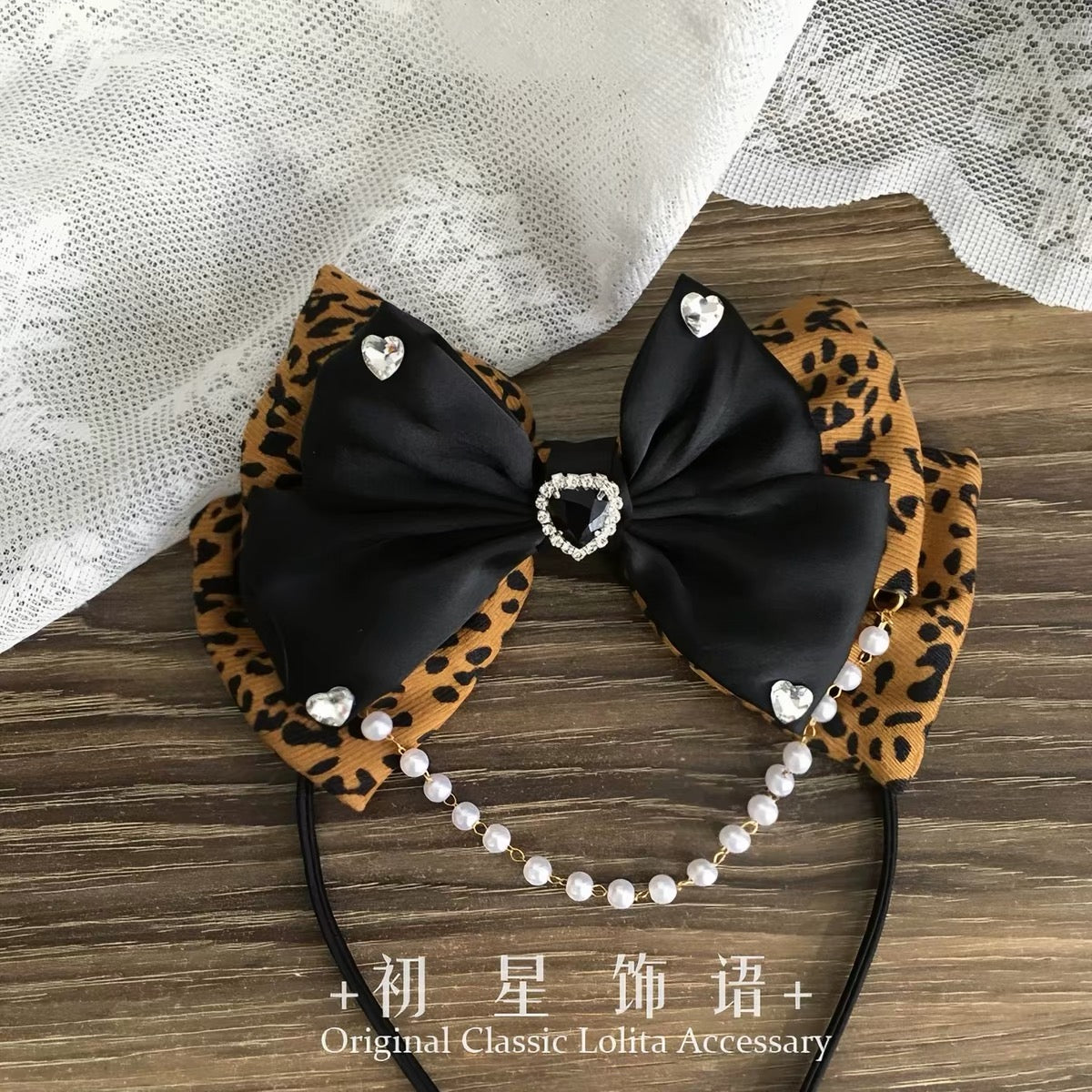 Leopard and black double bow headband with pearl chain and rhinestone hearts