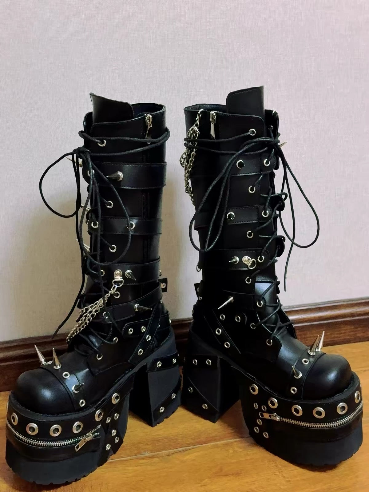 Black spiked chain platform boot single side view