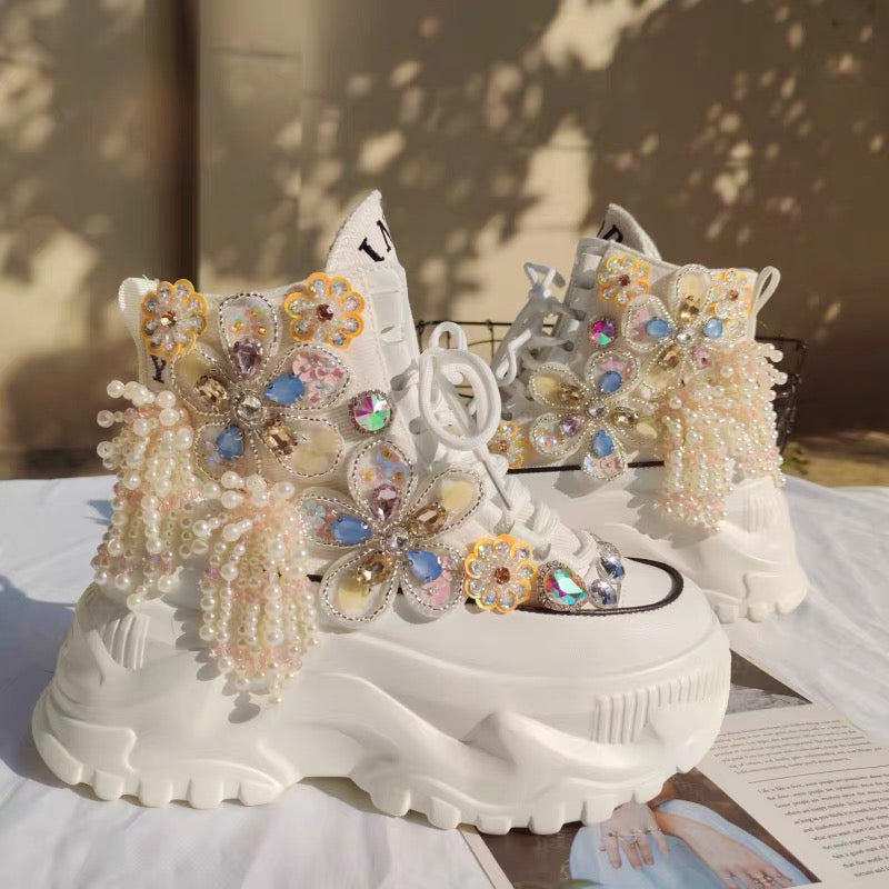 White embellished platform shoes with butterfly crystals and pearl fringe
