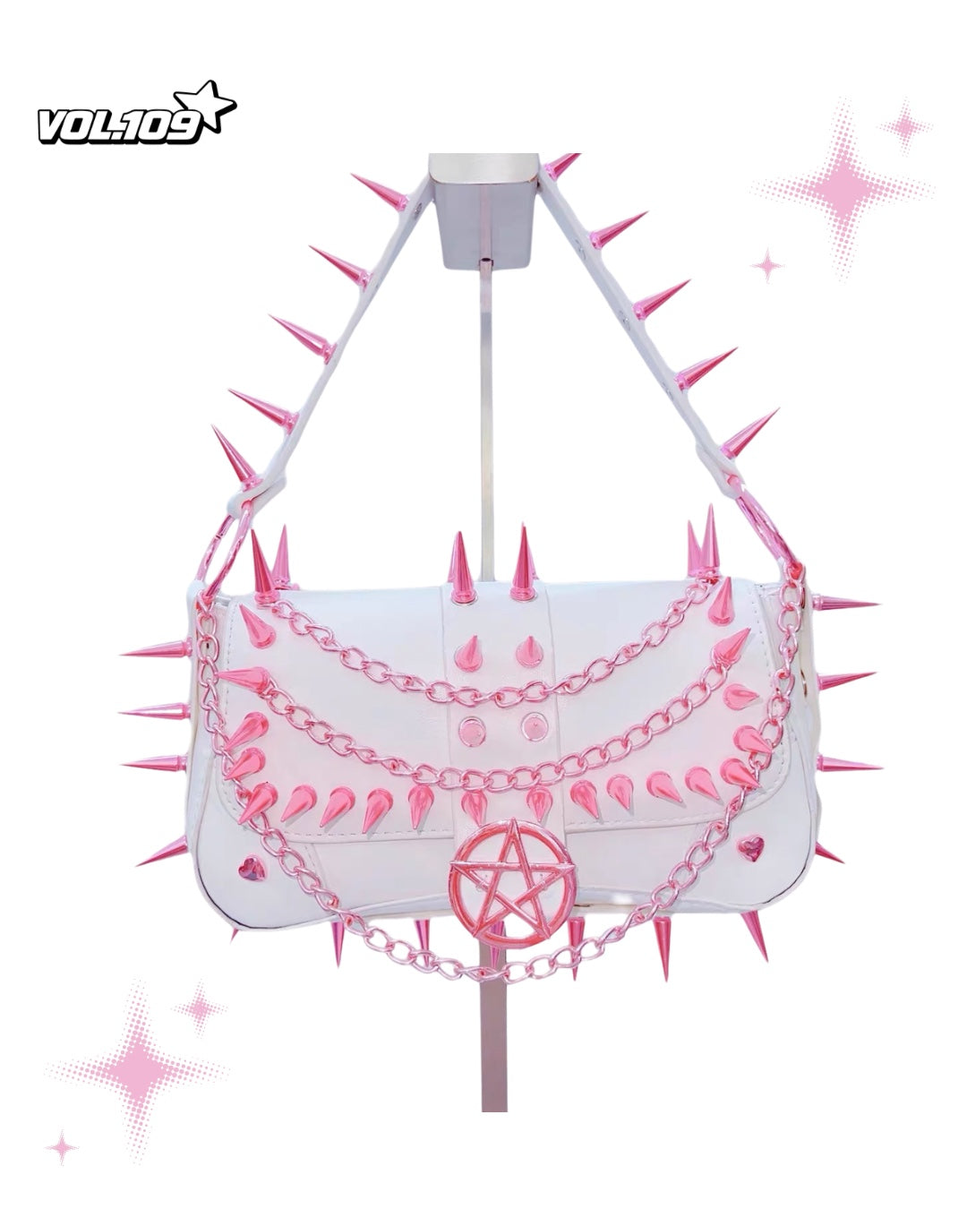 White shoulder bag with pink spikes, chains and pentagram detail